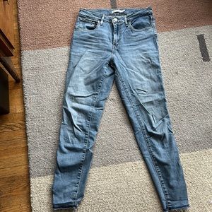 Levi’s 721 high rise skinny jeans with denim bows on the ankles